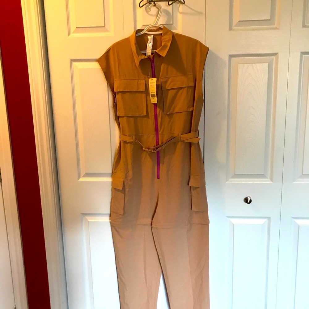 One piece jumpsuit with contrasting zippers